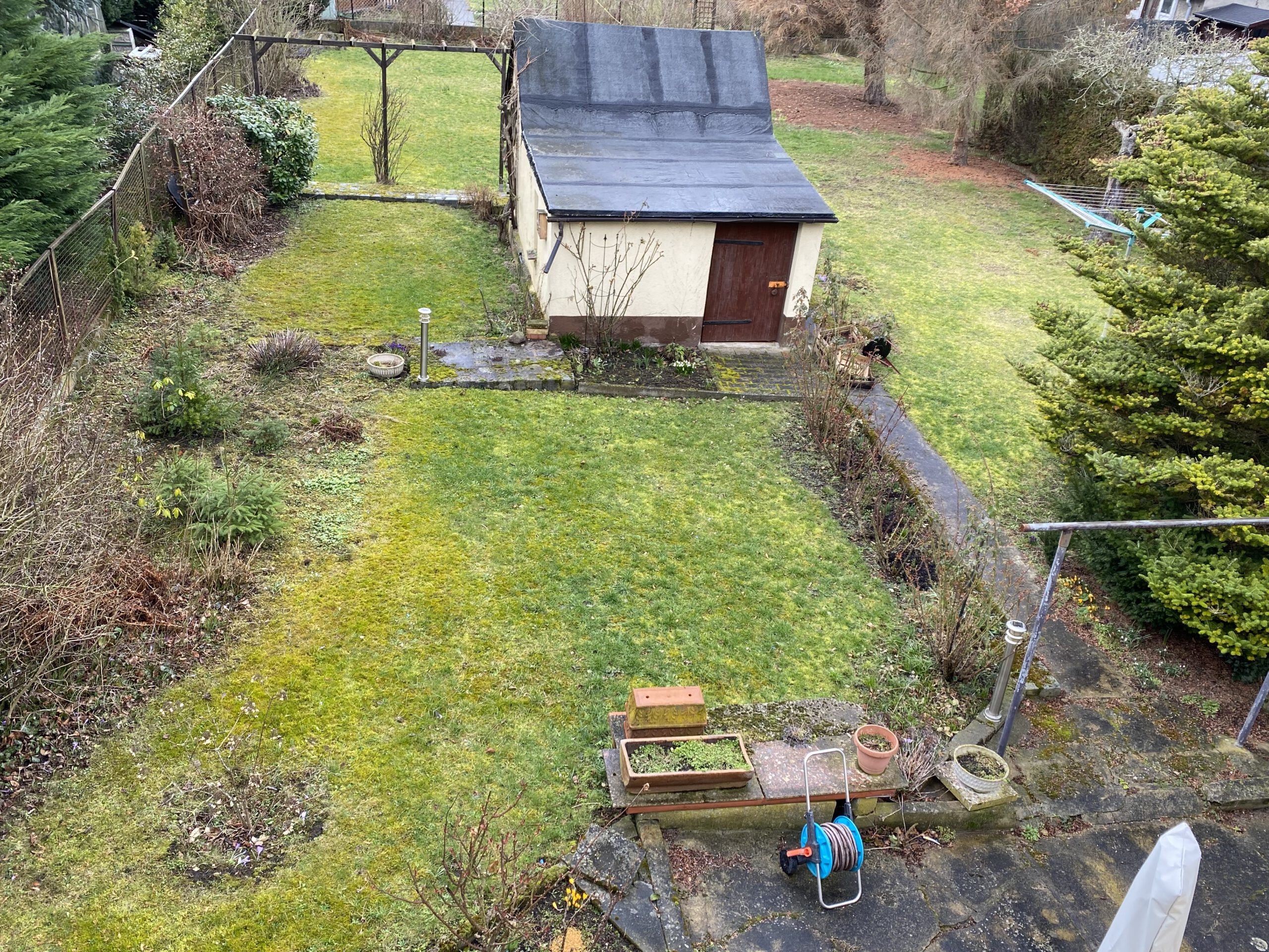 Einfamilienhaus in der Frohen Zukunft - Blick vom Dachgeschoss in den Garten