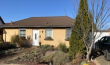 Bungalow in Büschdorf - Straßenansicht mit Garage