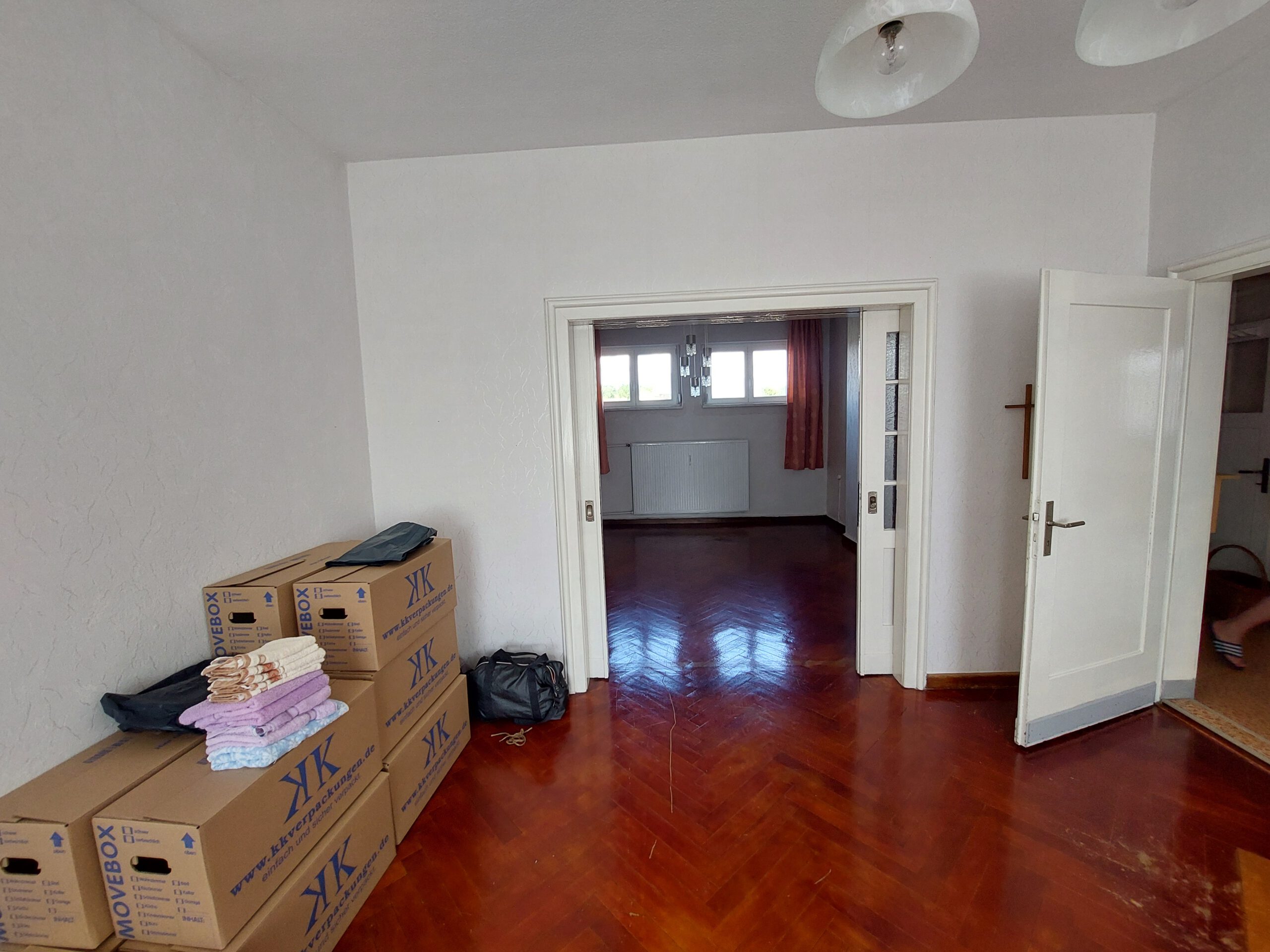 Wohn- und Geschäftshaus - Wohnzimmer im OG